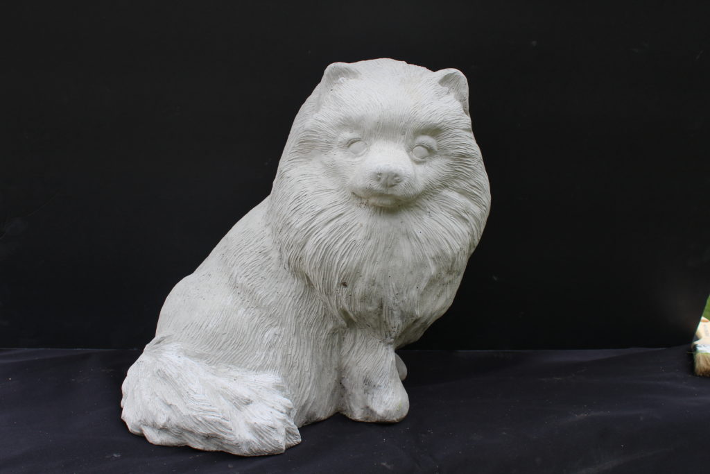 concrete pomeranian statue